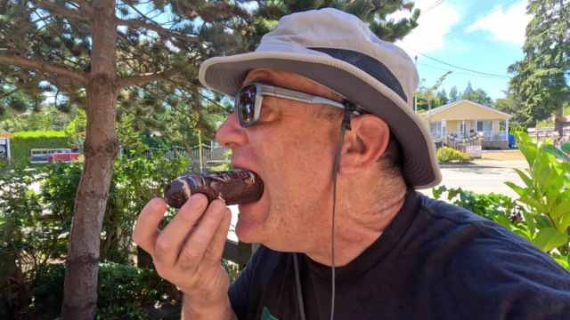 Breakfast Donut at Rhino Coffee House in Tofino, as usual I am stuffing my face in this photo