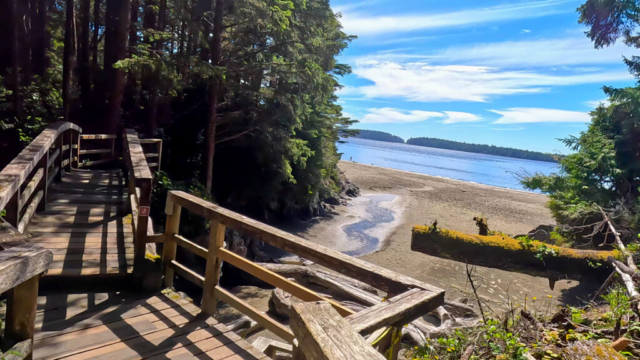 Path to Tonquin Beach in Tofino, with wooden bridges and stairs, and beach in the background